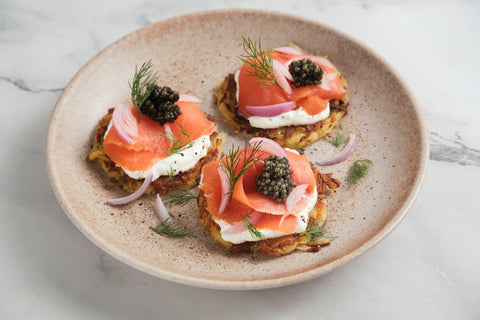 Potato Rosti with Smoked Salmon and Kaluga Caviar on a plate