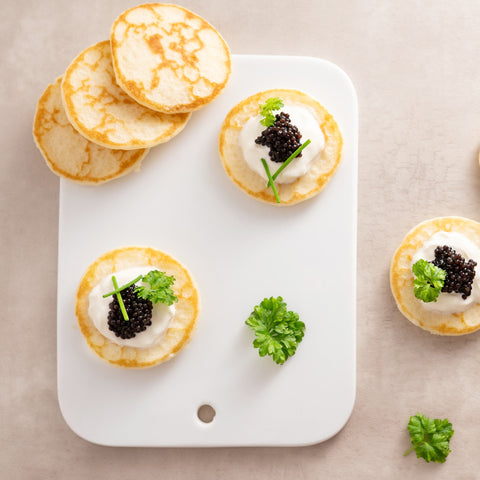 Kaluga Caviar and mini blinis French-style